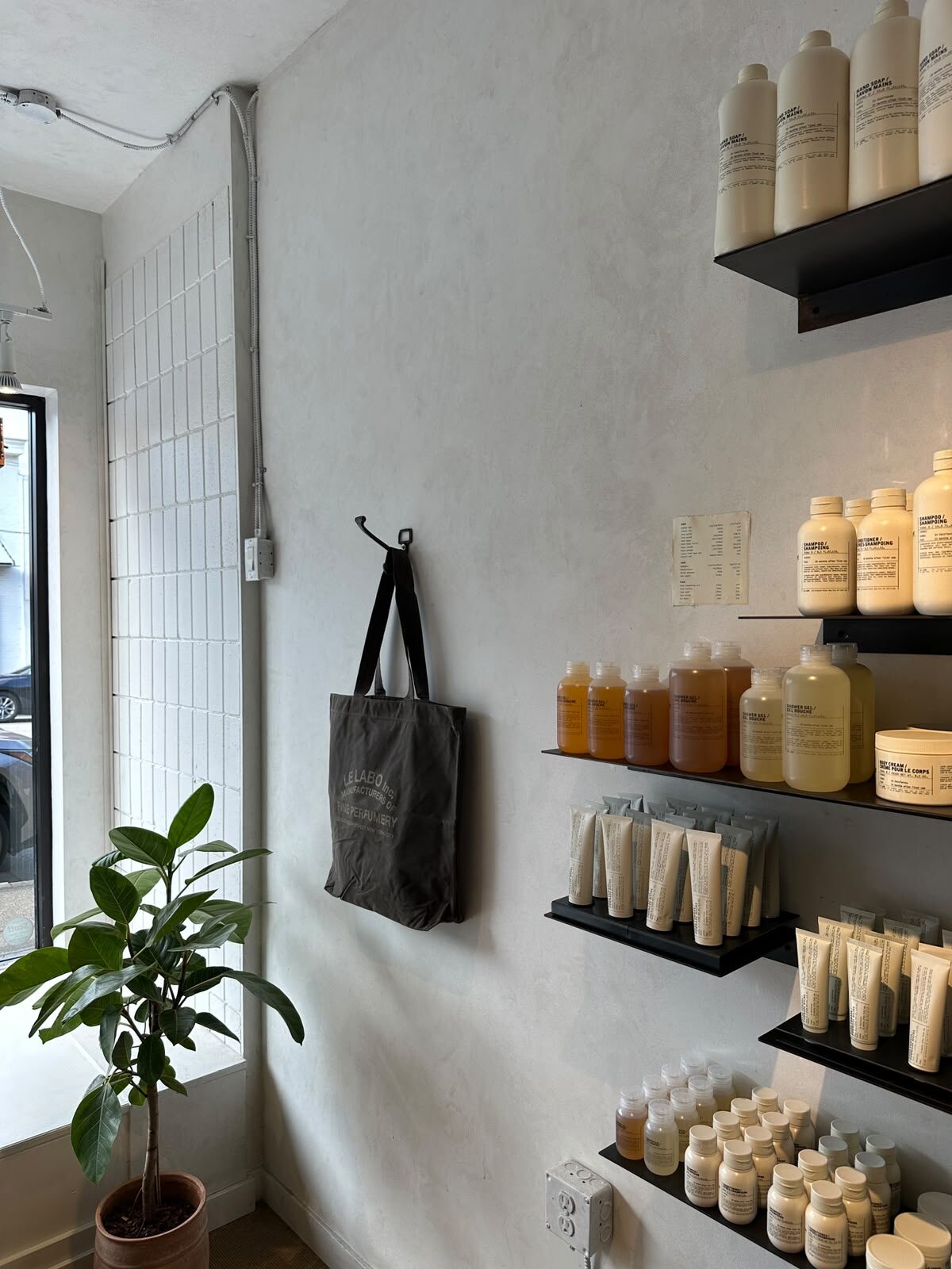 Boutique interior with wall shelving kept in top condition